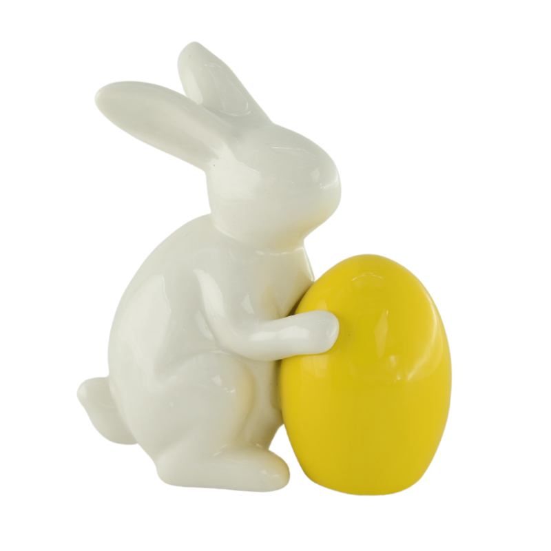 Figurka biały zając z żółtym jajkiem